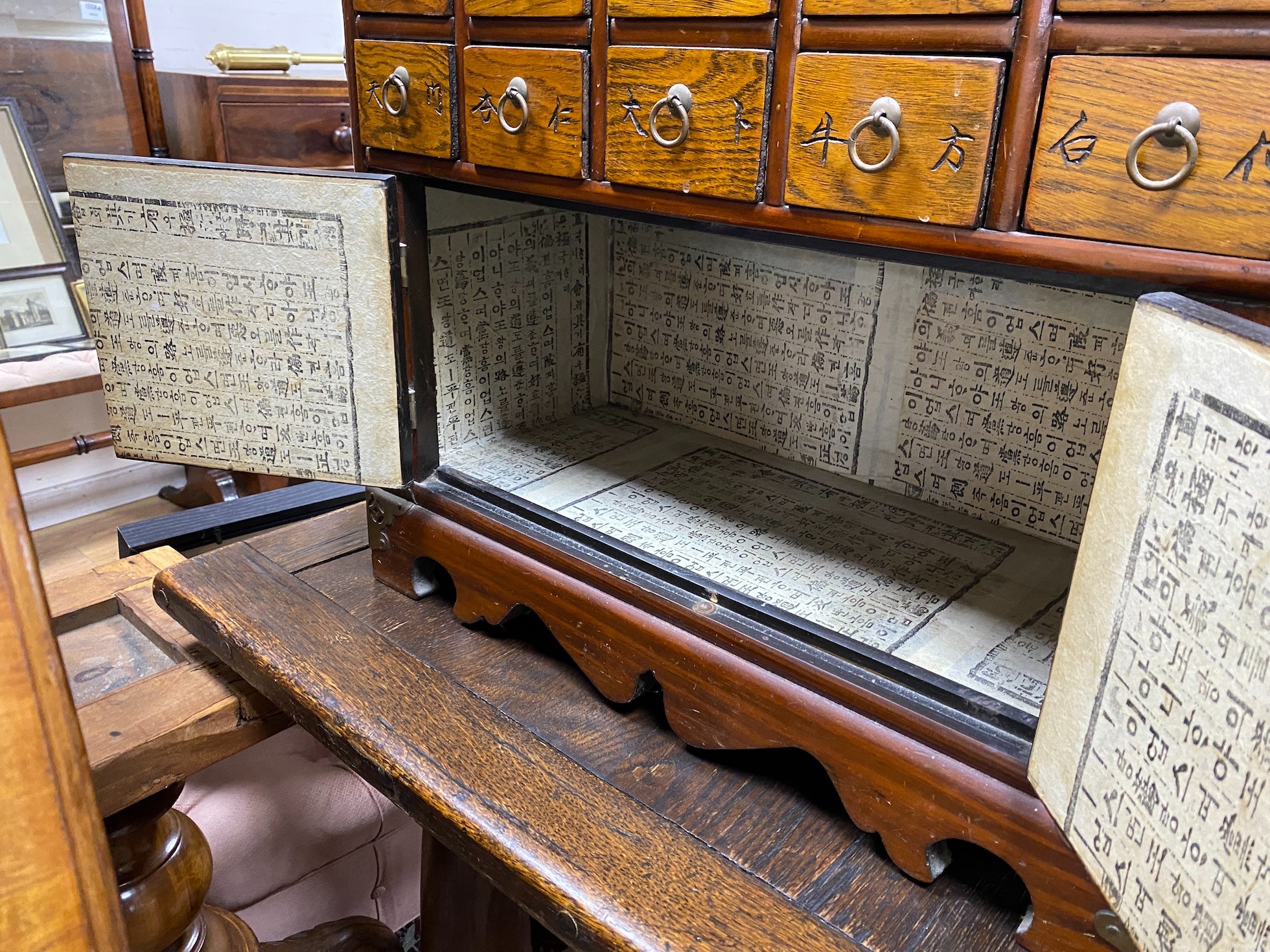 A Chinese elm medicine cabinet, width 65cm, depth 25cm, height 64cm